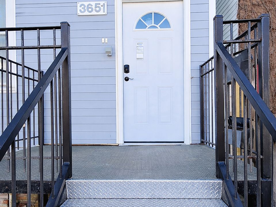 Stairs leading to front entrance.
