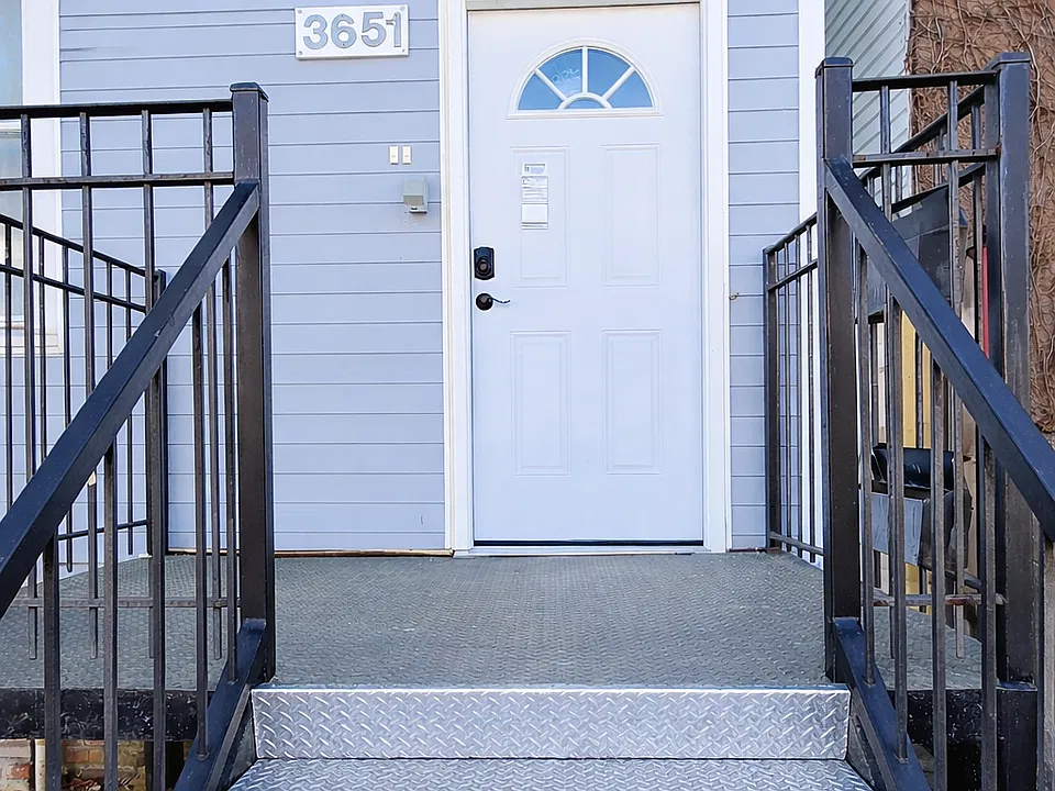 Stairs leading to front entrance.