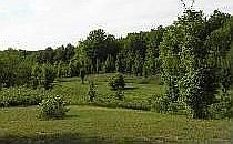 Hill top setting provides panoramic views of the surrounding countryside.