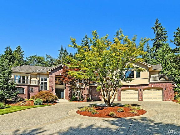 This 4 bedroom, 5.25 bath home offers a spacious versatile floor plan for graceful entertaining and relaxed everyday gatherings. Custom cherry built-ins and cabinetry, wood wrapped columns, doors and windows, solid core interior doors, all bedrooms have en-suite baths, marble, granite and leaded glass accents are a few of the high end features.