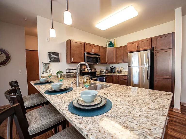 Kitchen with Island, granite countertops, and stainless appliances