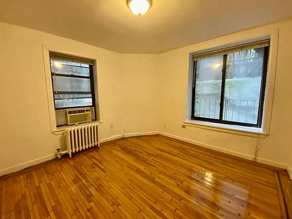 4th image of 210 E 10th St APT 2A