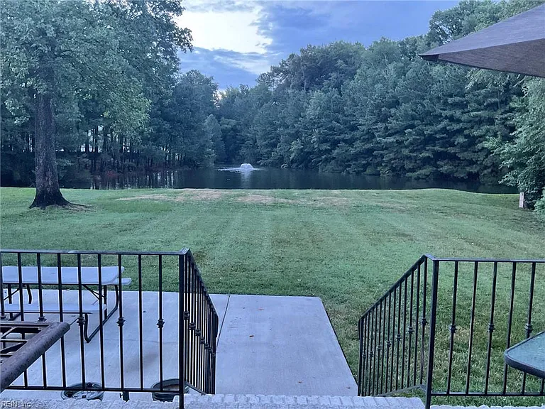 View of backyard while sitting on patio
