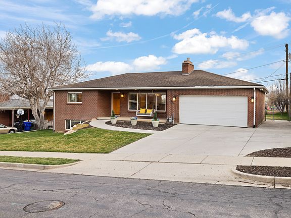 We spend all of our time on the front porch swing. One thing you'll notice about this home's exterior is brick around the whole home. No cheap stucco here.