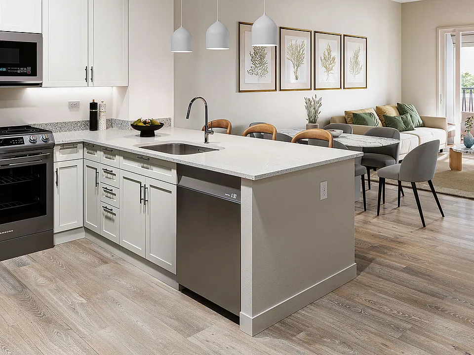 Experience the elegance of this contemporary kitchen and living area designed for modern comfort.
