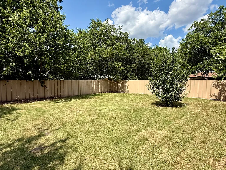 Fully fenced backyard offering privacy