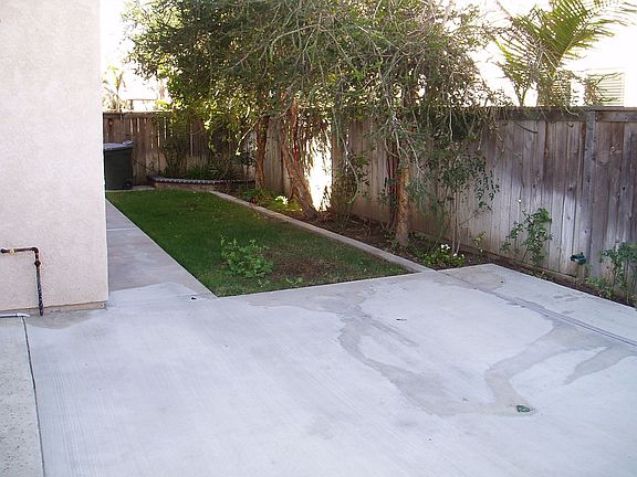 Back yard with patio and lawn
