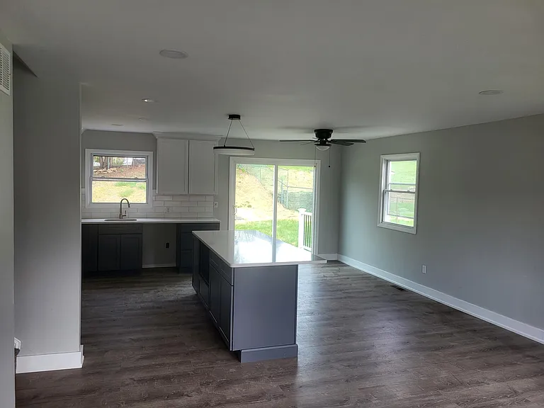 upper level living space with full kitchen access to rear yard