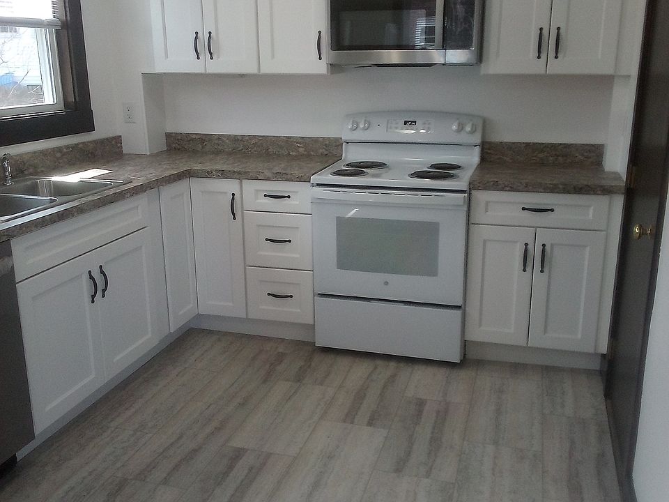 Kitchen with microwave and stove