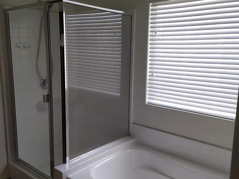 Master bathroom with shower, oversized tub and private toilet.