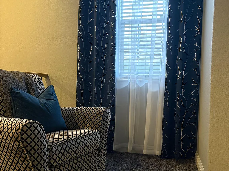 Inviting reading nook with a comfortable armchair seating