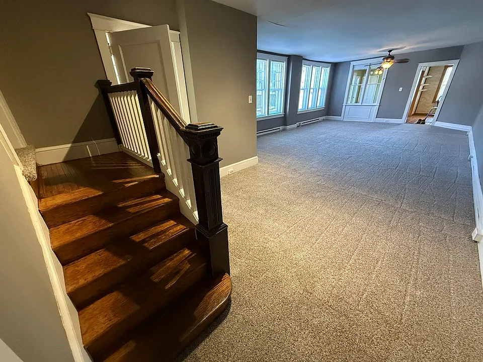 Entry area, steps to bedrooms, living room
