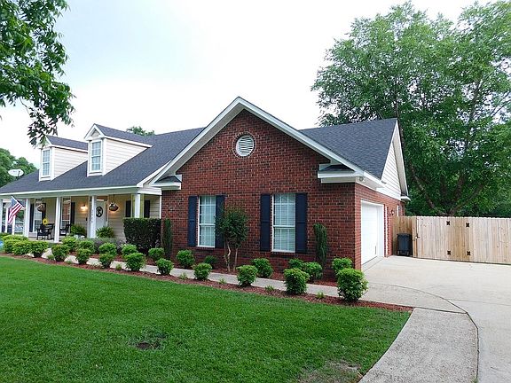 Driveway, 2-car garage, gate