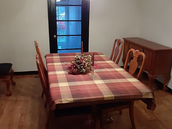 Sun porch behind dining room