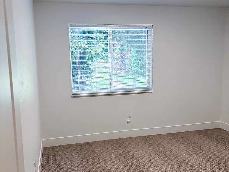 Large bedrooms with fresh finishes and natural light create the perfect retreat.