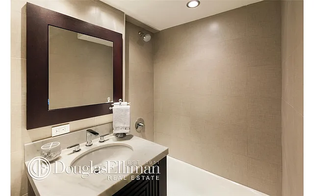 Sold by Douglas Elliman | media 18