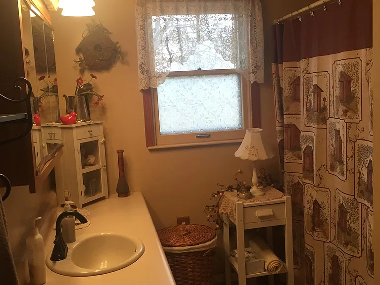 Bathroom with tub and shower
