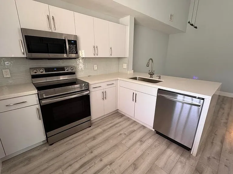 6936 SW 39th St #D203 — Photo 1