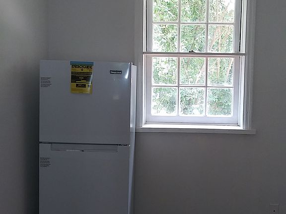 Kitchen facing west window (toward neighbor)