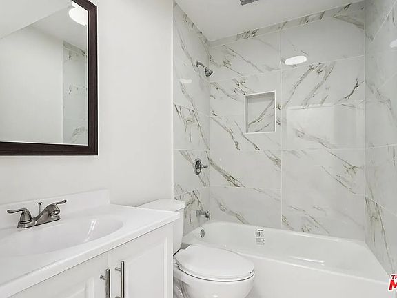 5th image of 1673 1/2 E 111th St #1673-1/2