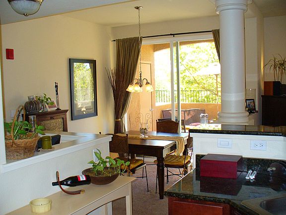 Looking from the kitchen toward the breakfast nook and outdoor patio.