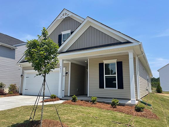 Rocking chair covered front porch.
