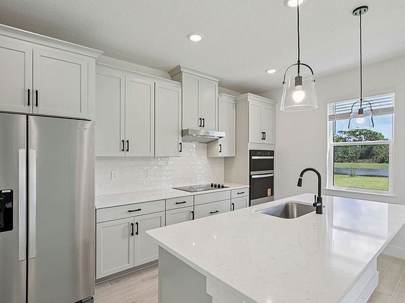 The Prato Floorplan Kitchen at 442 Sun Chaser Dr.