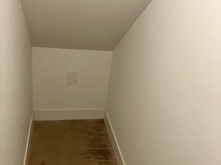 Storage under stairs (secured with a schlage code lock)