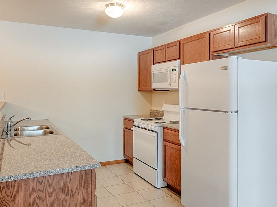 White appliances and Granite Countertops in Select Homes