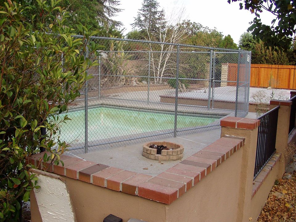 House burned down! empty pool gated for safety
