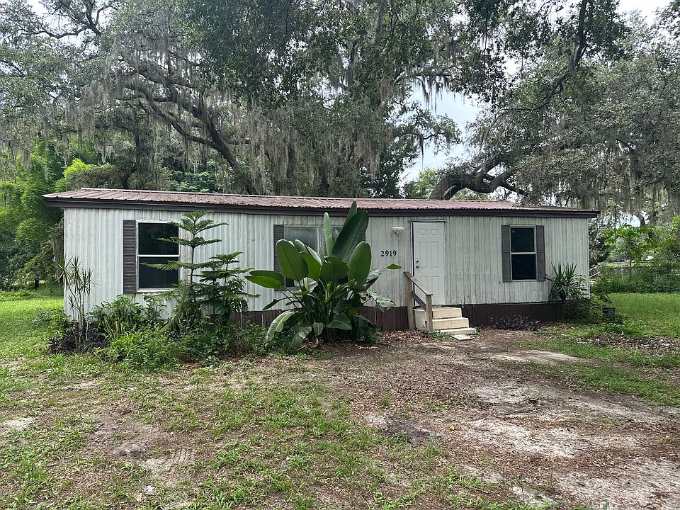 Front of the home, it sits back from the road quite a distance, freshly painted interior, all new carpet and vinyl plank flooring throughout