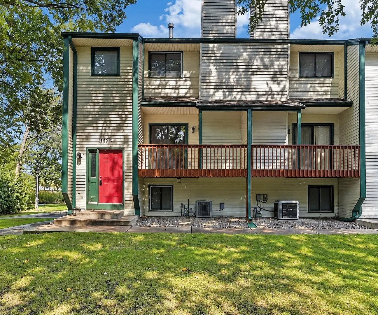 Spacious 3-Bed End-Unit Townhome with 2-Car Garage & Private Deck — Photo 1