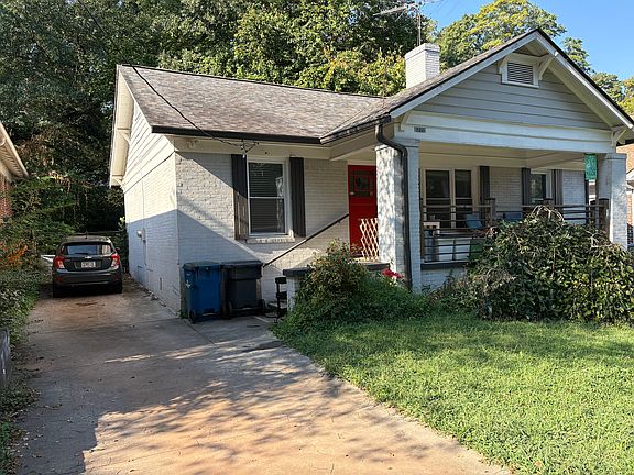Side angle of home - driveway can fit up to 3 cars
