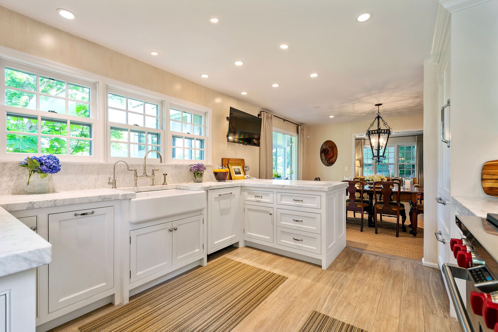 Chef's kitchen open to dining