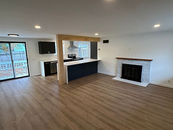 Open living, dining, & kitchen space