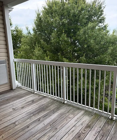 Balcony with wooded view