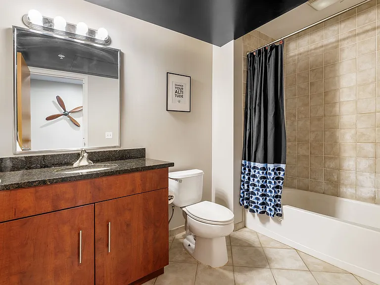 Full bath with modern tile and vanity