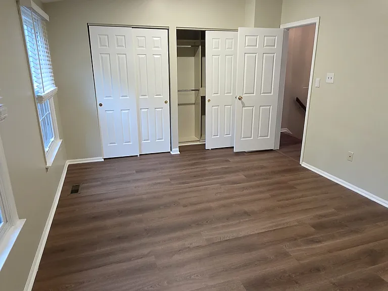 Primary Bedroom with two Large Closets