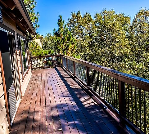 Wrap around deck to enjoy the beautiful views.