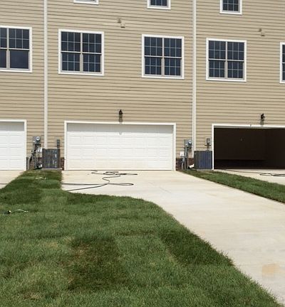 Oversized 2 car garage and small back yard for play or for a
