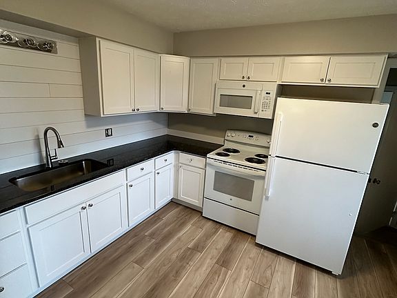 all new cabinets, countertop and appliances