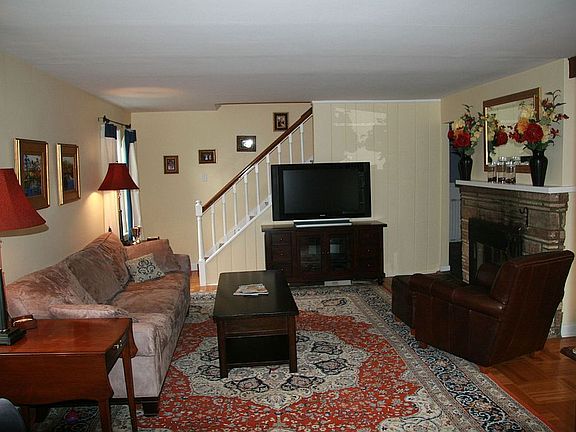 Spacious Living Room with Fireplace