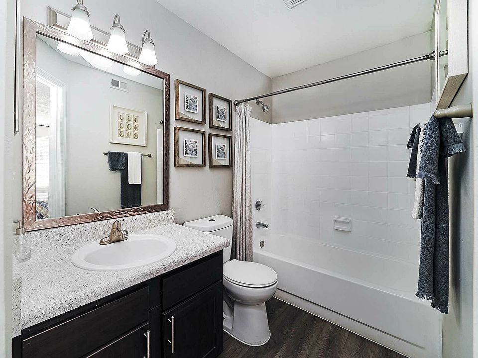Experience elegance in this beautifully designed bathroom, offering a perfect blend of style and comfort.
