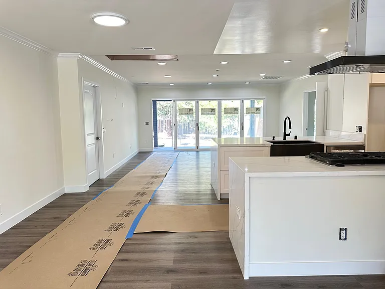 open concept kitchen seamless to the bi-fold doors