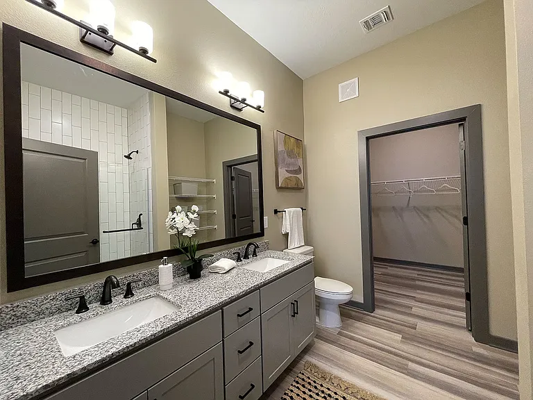 Experience luxury in every detail with this elegantly designed bathroom space.