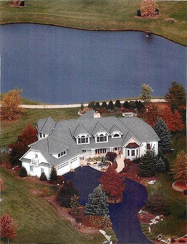  Aerial View was taken years earlier, and now the Landscaping is Matured. 