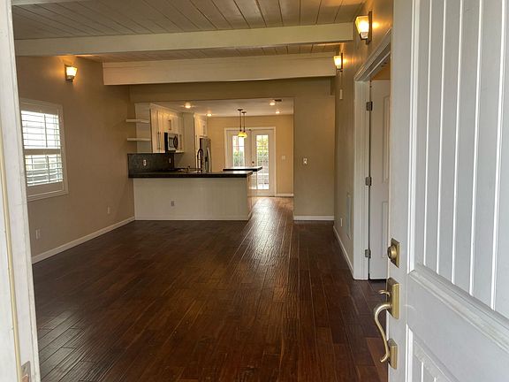 On the right you can see the double doors to guest bedroom #3 that opens into the living room.
