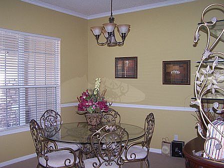 Seperate Dining with Crown Molding and Chair Rail