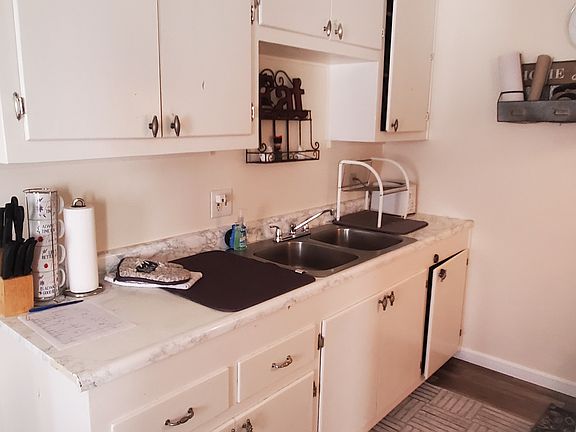 Nice kitchen, fully equipped with gas stove, refrigerator dishes, silverware & cookware.