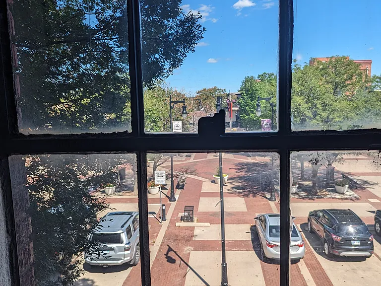 Common area window viewing courtyard where Old Town Farm and Art Market is held on Saturdays